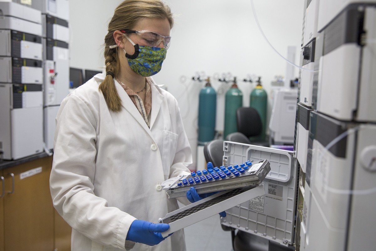 Leta Landucci carries popular tree enzyme samples to a mass spectrometer.
