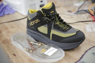A shoe sole with an embedded energy harvester