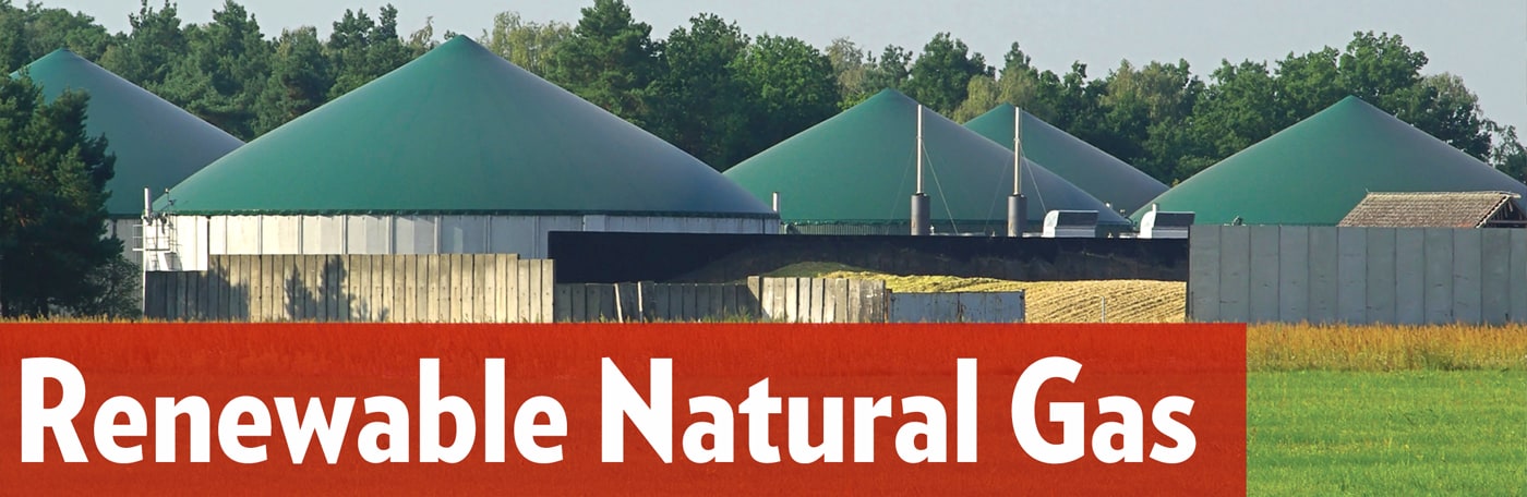 Anaerobic digester facilities at a farm in WI with the words "Renewable Natural Gas" 