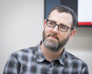 Headshot of J. Paul Kelleher