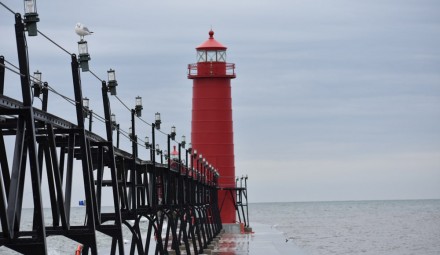 A red lighthouse on a dreary day