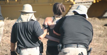 Protester Cindy Spoon (center) was arrested in August 2018 after kayaking near a construction site for the Bayou Bridge pipeline in Louisiana. She said she did nothing illegal, and prosecutors have not acted on the case