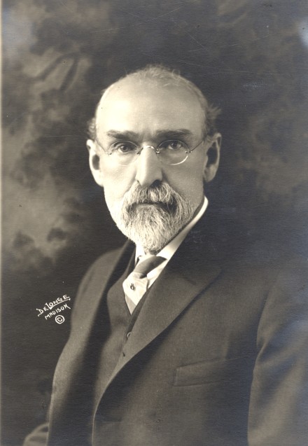 Black and white portrait of a man wearing a suit