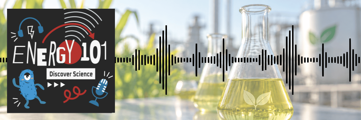 Energy 101 podcast banner: 'Discover Science' logo with headphone, microphone, and cartoon microbe icons on the left, overlaid on a photo of yellow-filled Erlenmeyer flasks and a corn field with an industrial facility, with an audio waveform graphic across the image.