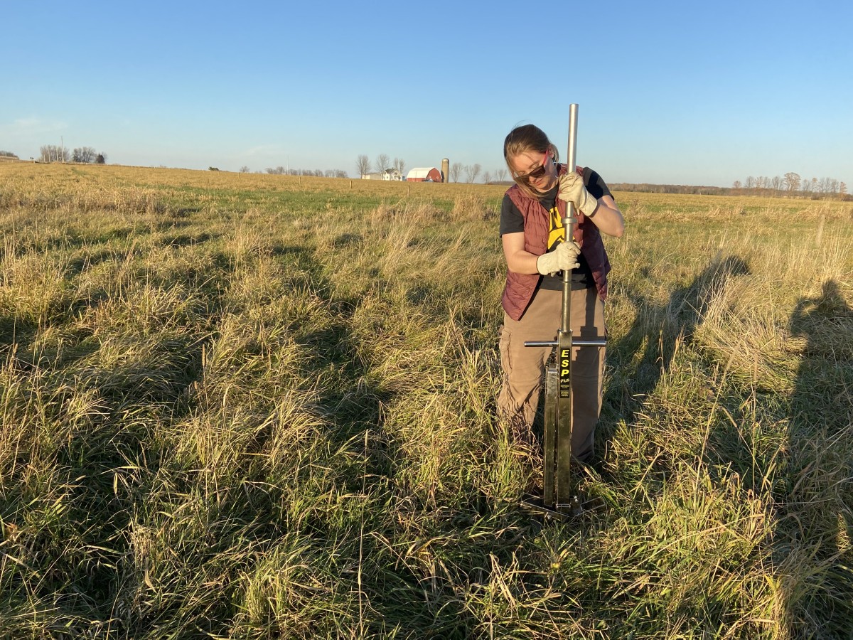 Clare Dietz getting soil sample