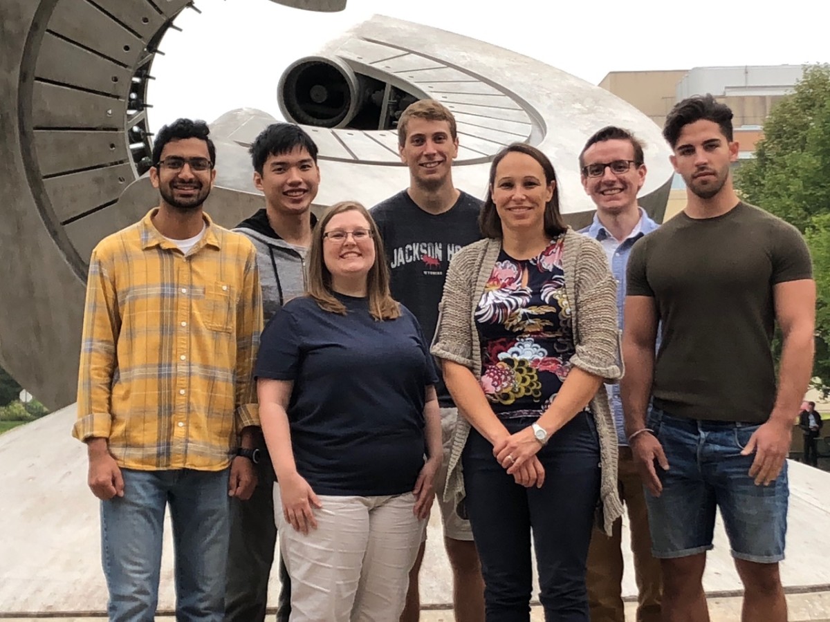 Jennifer Franck poses with members of her lab