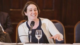 Jennifer Reed speaking at a conference