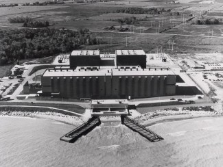 Aerial black and white photo of a nuclear power plant