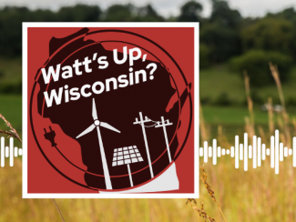 Watt's Up, Wisconsin logo with a photo of a prairie in the foreground and farm in the background.
