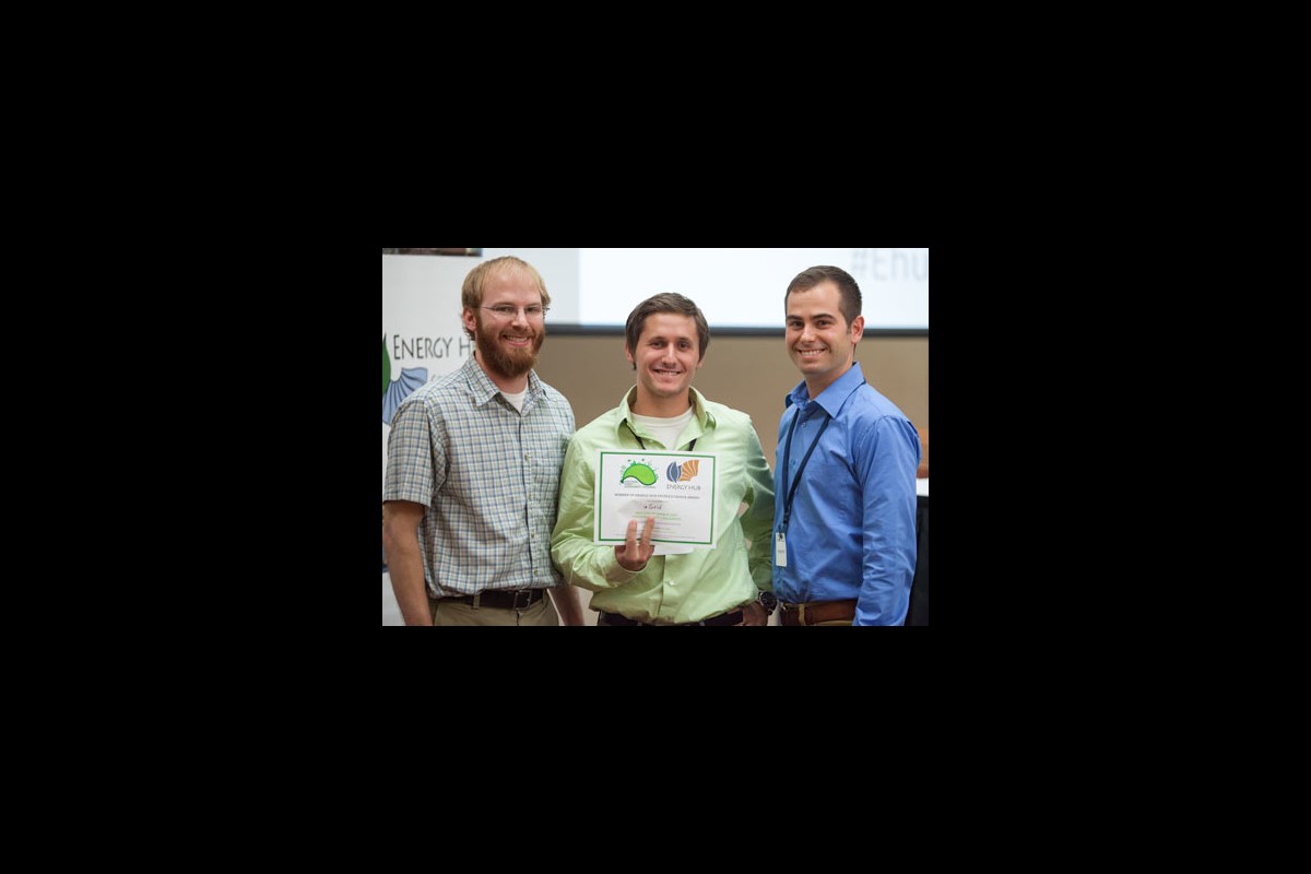 uGrid, represented by Joe Goldman (middle) and Craig Poulin (right), won the Energy Hub People's Choice Award at the November WESC.