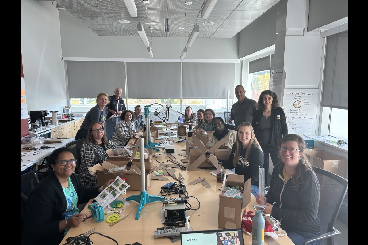 Educators at KidWind Workshops dive into a KidWind kit that they can bring back to their teaching spaces.