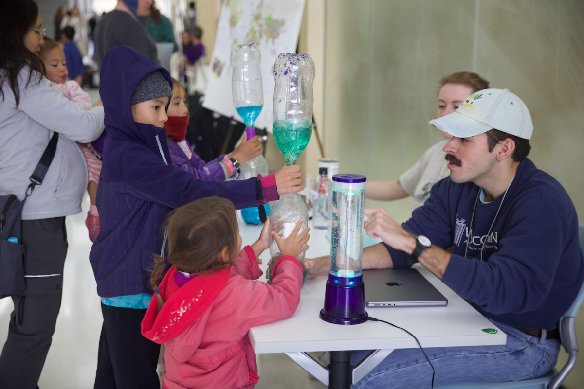 Students participate in a hands-on tornado activity.